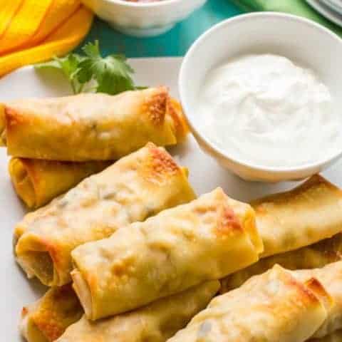 Baked southwestern egg rolls with chicken, black beans and cheese make a perfect game day or party appetizer - these are always a hit! | www.familyfoodonthetable.com