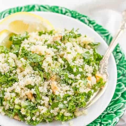 Kale quinoa salad with chopped walnuts, grated Parmesan cheese and a white wine vinaigrette is a light, fresh and healthy side dish! | www.familyfoodonthetable.com