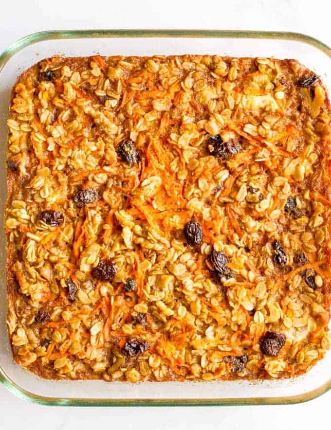 Carrot cake baked oatmeal is naturally sweetened and loaded with walnuts and raisins for a healthy make-ahead breakfast! | www.familyfoodonthetable.com