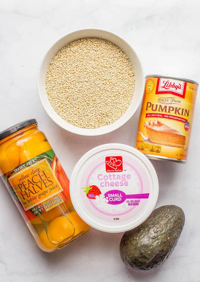 Homemade baby food quinoa, peaches, avocado, pumpkin and cottage cheese ingredients