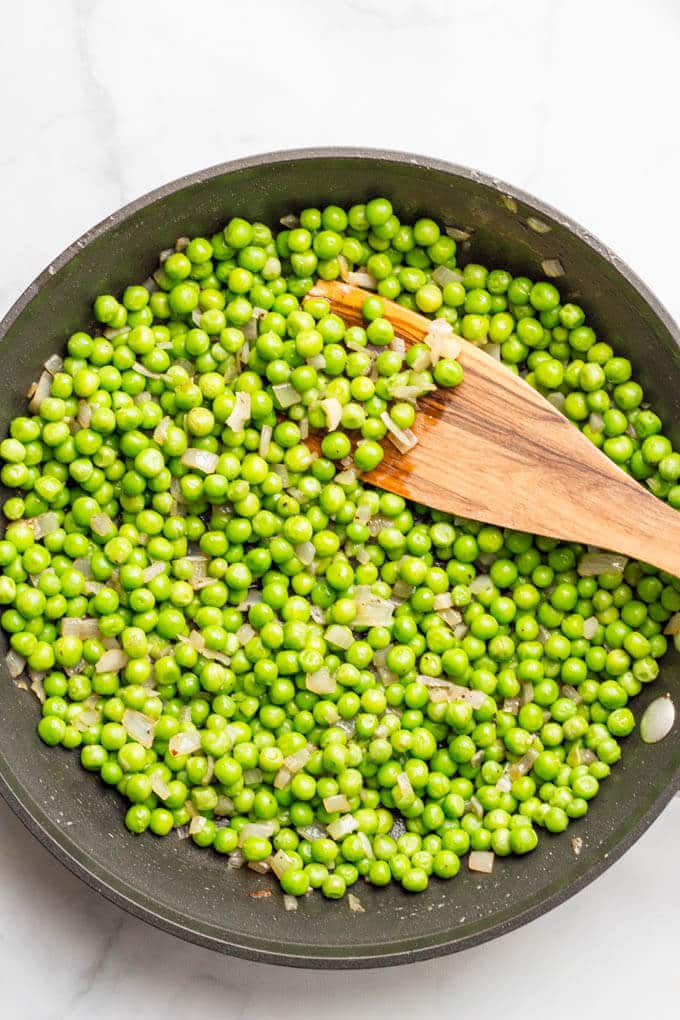 Peas with bacon, shallots and Parmesan cheese