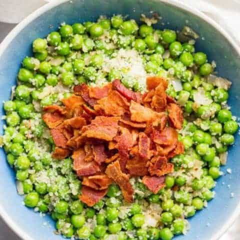 Peas with bacon, shallots and Parmesan cheese is a quick and easy side dish and super flavorful way to dress up a bag of frozen peas! | www.familyfoodonthetable.com