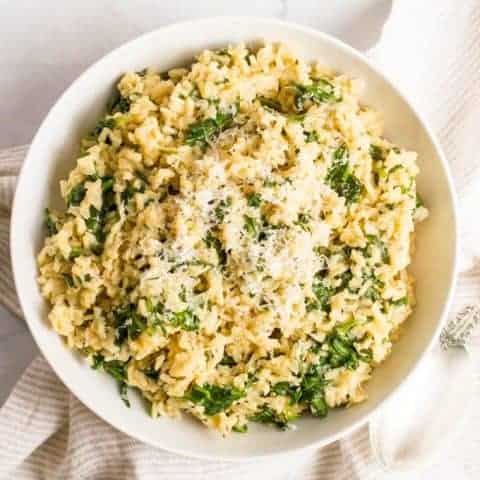 Brown rice with spinach and Parmesan cheese is an easy, healthy, one-pot side dish with just a few simple ingredients! | www.familyfoodonthetable.com