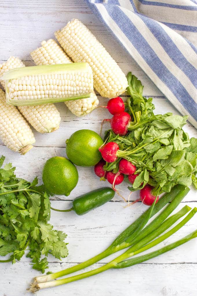 Quick + easy spicy corn radish salad with cilantro and a zesty lime vinaigrette