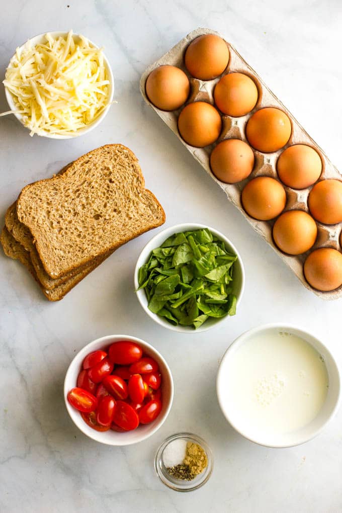 Ingredients laid out to make individual egg breakfast casseroles