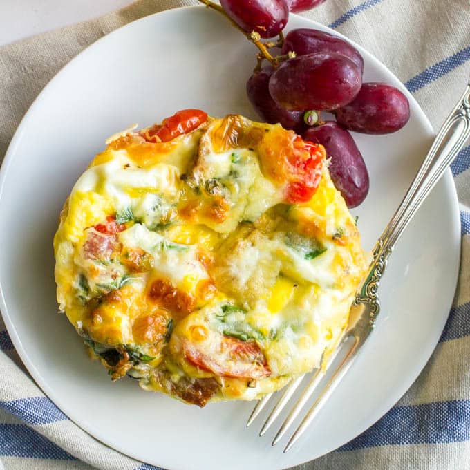 Individual breakfast casserole served on a white plate