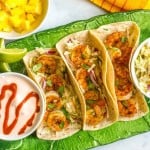 Shrimp tacos with lime cabbage slaw and spicy yogurt sauce