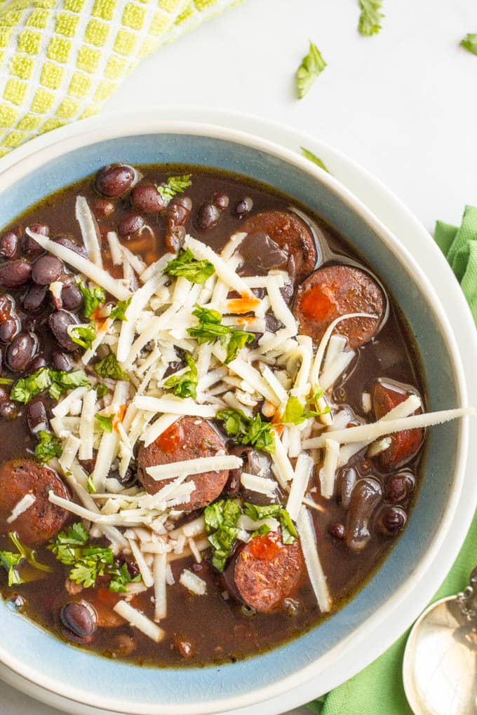 Slow cooker black bean chorizo soup is an easy-to-prep dinner with deep, rich flavors - perfect for a cozy night in! | www.familyfoodonthetable.com
