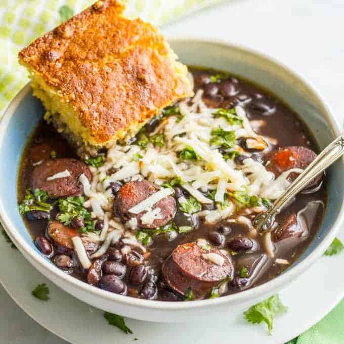 Slow cooker black bean chorizo soup is an easy-to-prep dinner with deep, rich flavors - perfect for a cozy night in! | www.familyfoodonthetable.com