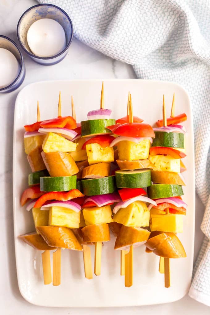 Sausage pineapple kabobs with BBQ sauce -- an easy, flavorful summer appetizer or dinner! | www.famillyfoodonthetable.com