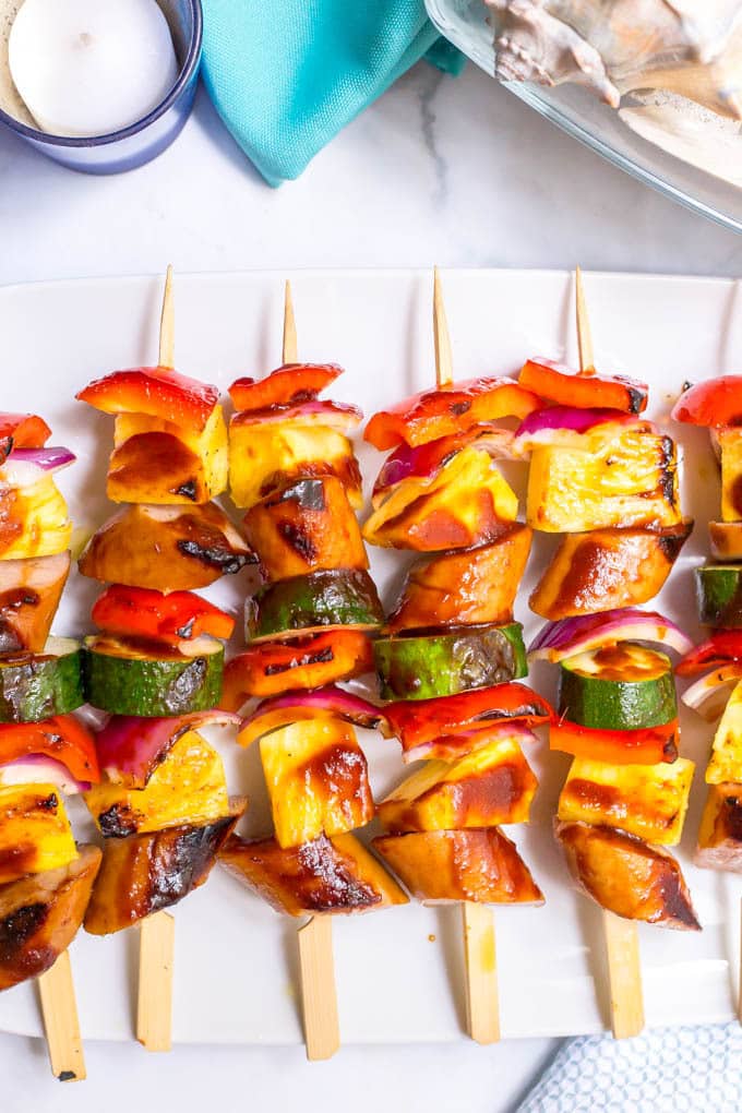 Sausage pineapple kabobs with BBQ sauce -- an easy, flavorful summer appetizer or dinner! | www.famillyfoodonthetable.com