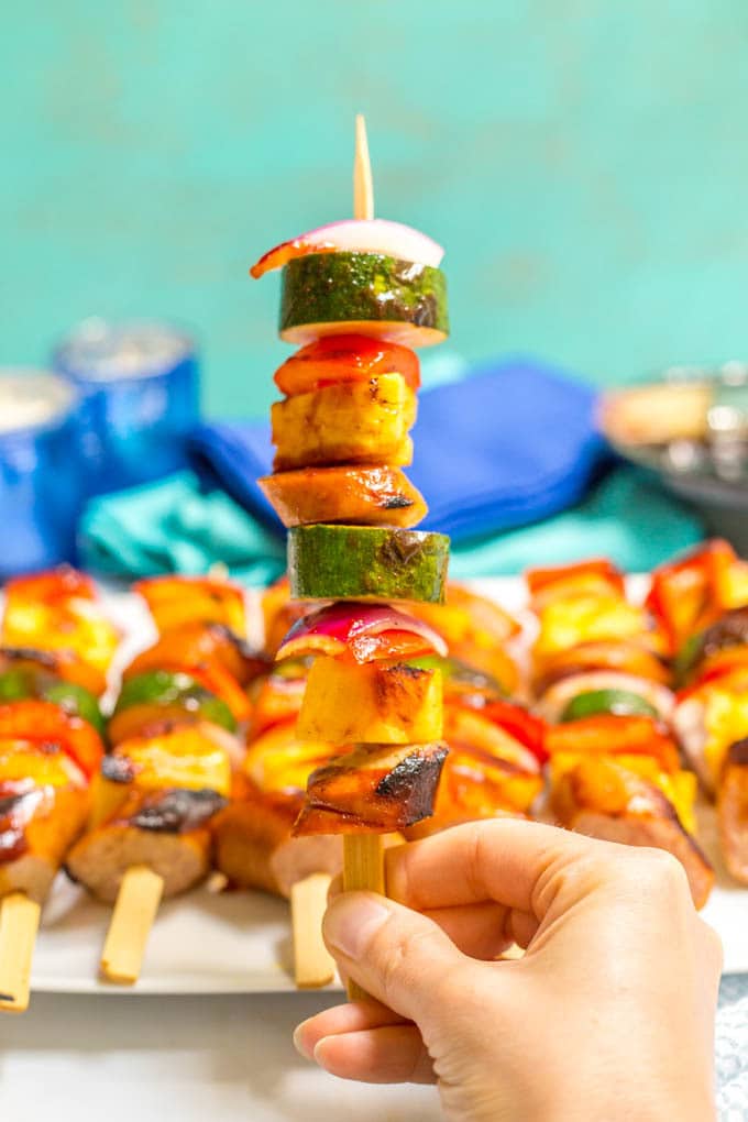 Sausage pineapple kabobs with BBQ sauce are a quick, no-marinade kabob recipe that’s perfect as an easy, flavorful summer appetizer or dinner! | www.famillyfoodonthetable.com