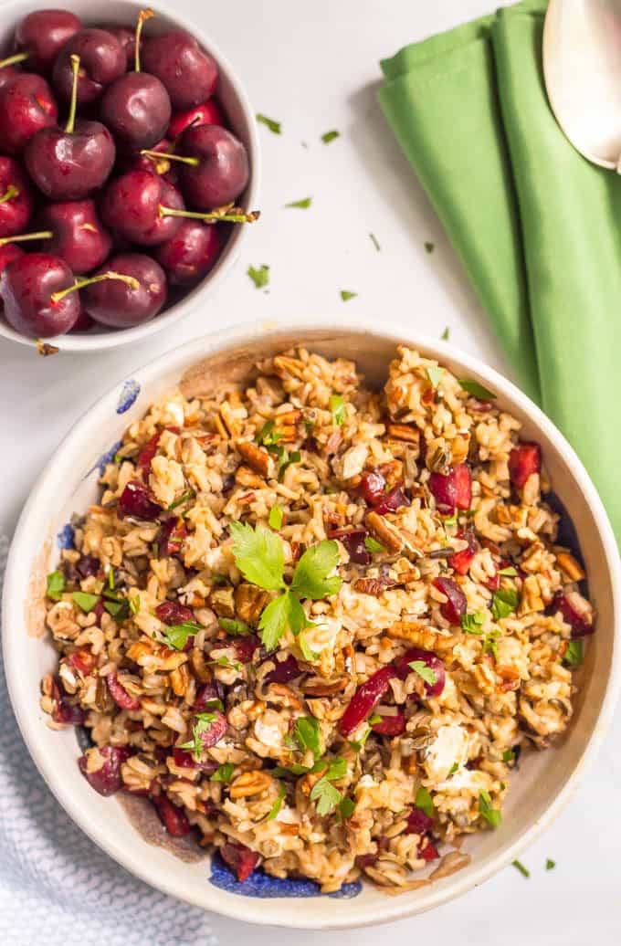 Wild rice salad with fresh cherries, pecans and goat cheese is a perfect, easy summer side dish! | www.familyfoodonthetable.com