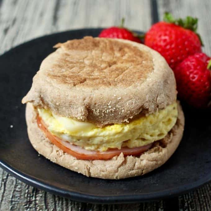 A homemade egg McMuffin ready in just 5 minutes for a quick and easy breakfast! The ramekin trick makes the perfect size and shaped egg! | www.FamilyFoodontheTable.com