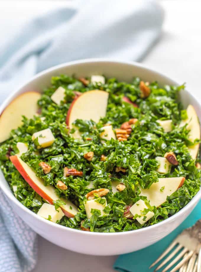 Kale apple salad with cheddar and pecans is an easy, flavorful massaged kale salad that's great as a side or for lunch! | www.familyfoodonthetable.com