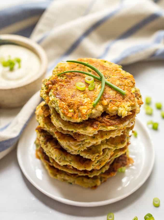 Whole wheat veggie pancakes with shredded squash and zucchini are an easy, fun way to get kids to eat their vegetables! They go great with Ranch dressing! #kidsfood #fingerfood #pancakes #healthyrecipe