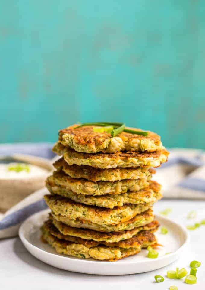 Whole wheat veggie pancakes with shredded squash and zucchini are an easy, fun way to get kids to eat their vegetables! They go great with Ranch dressing! #kidsfood #fingerfood #pancakes #healthyrecipe