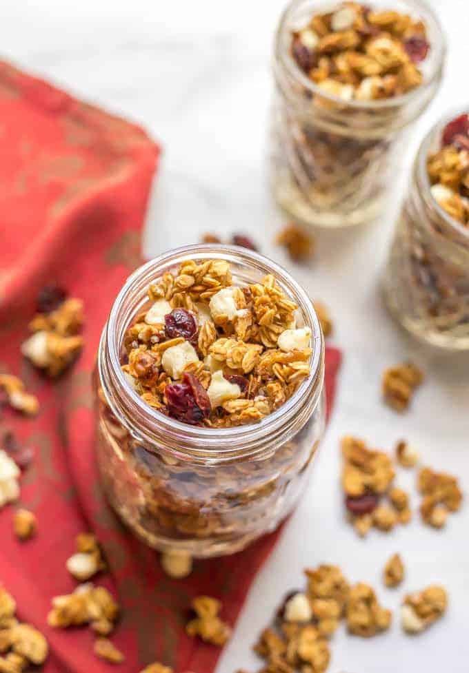 Cranberry white chocolate granola is an easy, delicious, and festive baked granola that’s perfect for healthy holiday breakfasts and snacking! | www.familyfoodonthetable.com