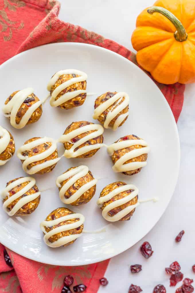 Pumpkin cranberry energy balls are an easy no-bake (and gluten-free) snack full of wholesome ingredients and yummy fall flavors! | www.familyfoodonthetable.com