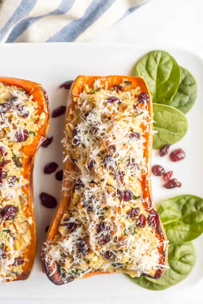 These stuffed butternut squash with quinoa, mushrooms and spinach are a gluten-free and vegetarian dish that’s hearty and filling and full of flavor!