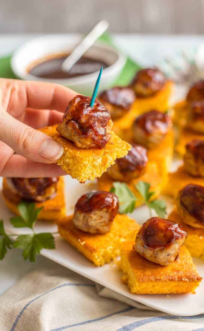 Chicken meatballs and cornbread appetizer with BBQ sauce is a fun, flavorful twist on party food that’s perfect for game day and entertaining! #meatballs #gameday #easyappetizers #southernfood | www.familyfoodonthetable.com