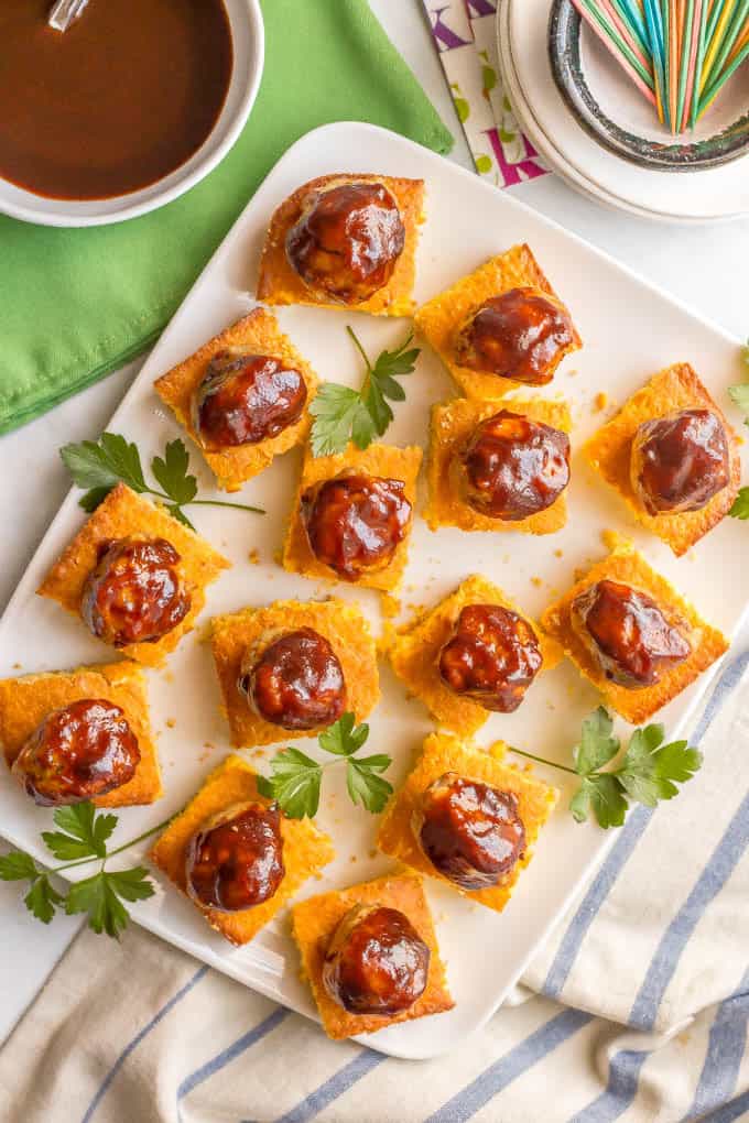 Chicken meatballs and cornbread appetizer with BBQ sauce is a fun, flavorful twist on party food that’s perfect for game day and entertaining! #meatballs #gameday #easyappetizers #southernfood | www.familyfoodonthetable.com