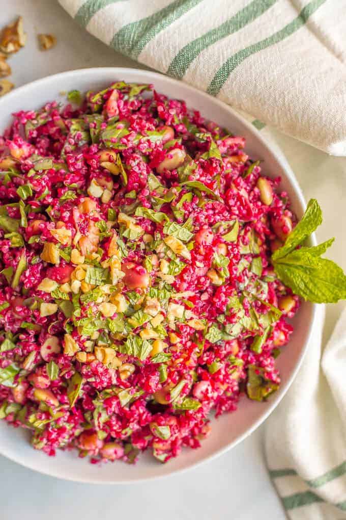 Spiralized beet quinoa salad with spinach, edamame, walnuts and an easy vinaigrette is a fresh, veggie-packed salad that’s perfect for a healthy lunch or as a side for dinner. (V, GF) #spiralizer #quinoa #salad #vegan #glutenfree
