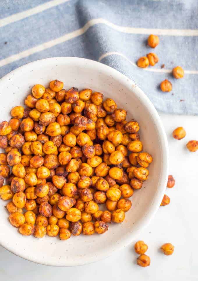 BBQ roasted chickpeas are crunchy, slightly spicy and totally addictive! They are great for a healthy, high-protein snack or to add some crunch to salads and wraps and dips. (Vegan, gluten-free) #chickpeas #healthysnack #vegansnack #glutenfreesnack