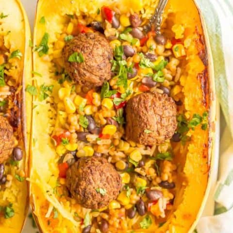 Southwest vegetarian stuffed spaghetti squash is a hearty and satisfying plant-based recipe with great flavor and textures. Add your favorite toppings and dig into this delicious dinner! #vegetarian #stuffedsquash #plantbasedrecipe | www.familyfoodonthetable.com