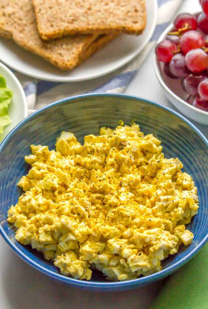 Curried egg salad is an easy, creamy, delicious lunch that’s perfect for sandwiches, wraps or lettuce wraps or with crackers and veggies. It’s just 5 ingredients and ready in about 30 minutes. #eggsalad #easylunch #vegetarianlunch | www.familyfoodonthetable.com