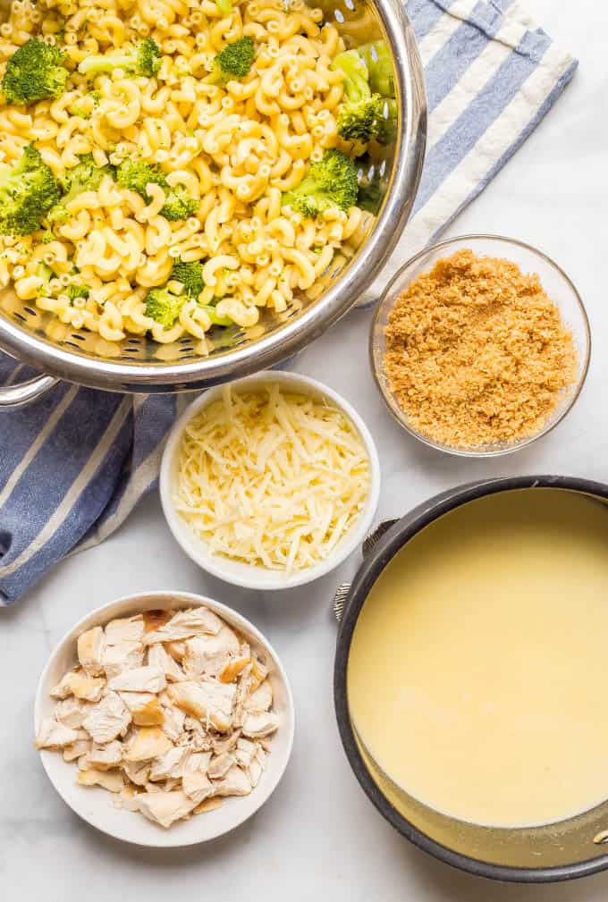 Ingredients for healthy chicken and broccoli mac and cheese laid out on a counter