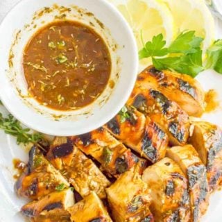 Balsamic herb grilled chicken marinade is tangy, herby and bright and perfect for a quick and easy marinade to give delicious flavor to your grilled rotation. | www.familyfoodonthetable.com
