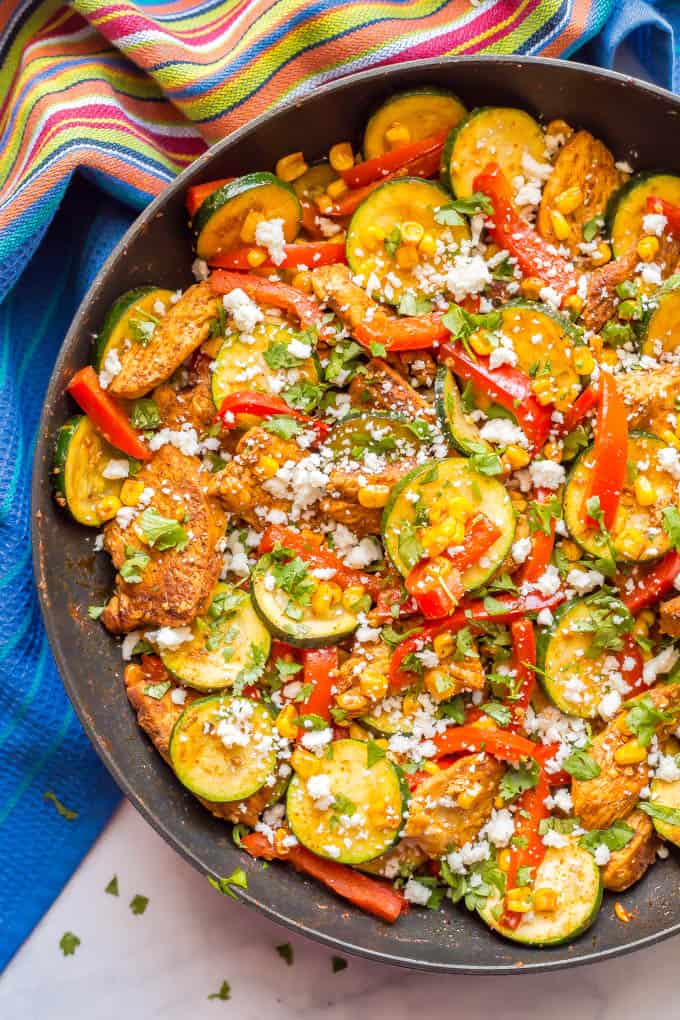 Chicken and zucchini skillet with corn is a one-pot wonder full of southwestern flavors, colorful veggies and juicy chicken. It’s a gluten-free and low-carb recipe that’s perfect for meal prepping. #onepotchicken #chickenskillet #lowcarbrecipe #chickenandveggies | www.familyfoodonthetable.com