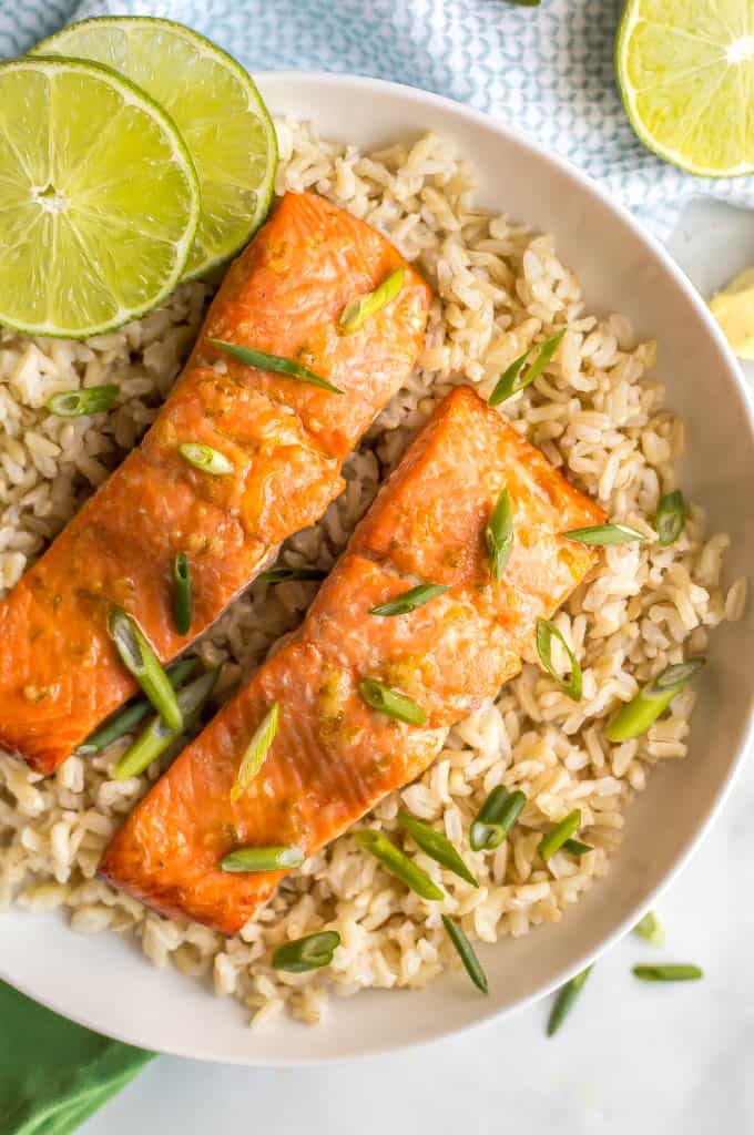 Honey lime salmon is an easy 5-ingredient recipe for a delicious marinated and roasted salmon dinner that’s perfectly tender, sweet and tangy! #salmonrecipe #seafooddinner #healthysalmon | www.familyfoodonthetable.com