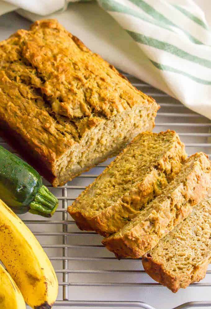Whole wheat zucchini banana bread is a healthy breakfast or snack that’s super light and flavorful (no butter or oil) and a great way to get in some fruit, veggies and whole grains all at once! #zucchini #bananabread #healthysnack #wholewheat