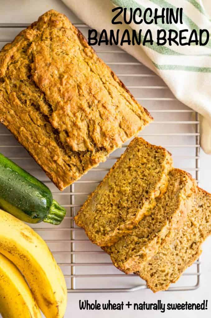 A loaf of zucchini banana bread on a cooling rack with a few pieces sliced with a text overlay on the photo.