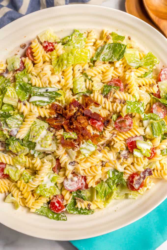 This creamy BLT pasta salad with an easy, homemade dressing is a healthier take on the classic and perfect for summer picnics, cookouts and parties! #pastasalad #BLT #summer #pasta #saladrecipes