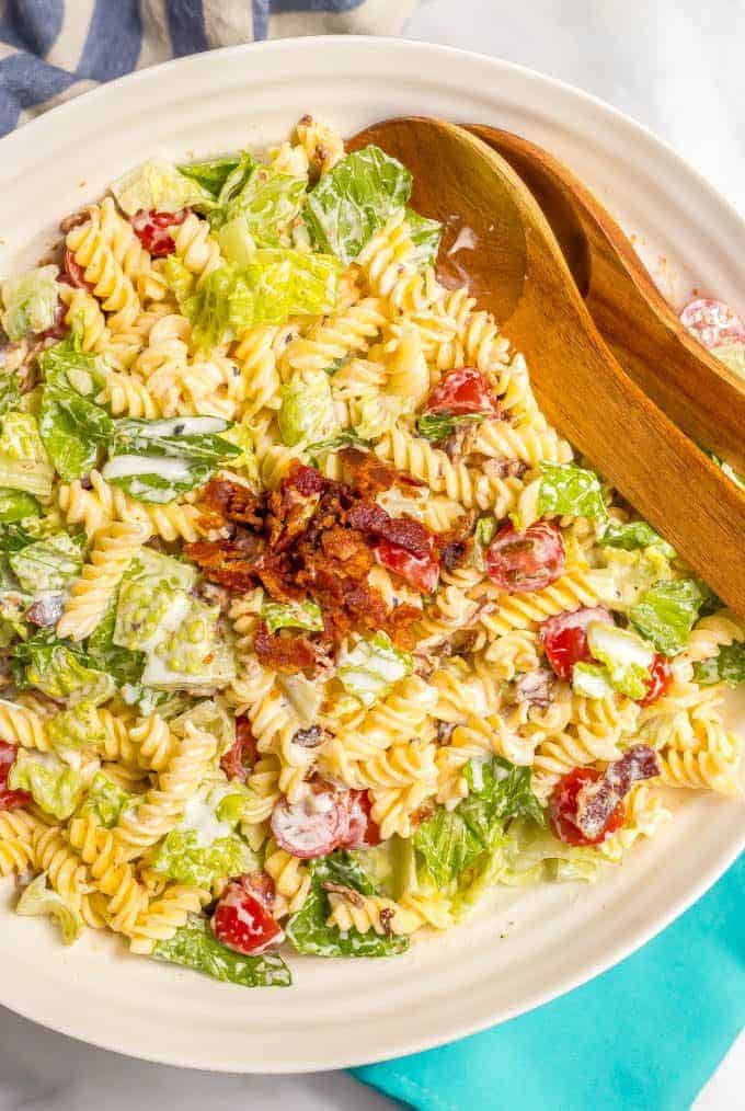 This creamy BLT pasta salad with an easy, homemade dressing is a healthier take on the classic and perfect for summer picnics, cookouts and parties! #pastasalad #BLT #summer #pasta #saladrecipes