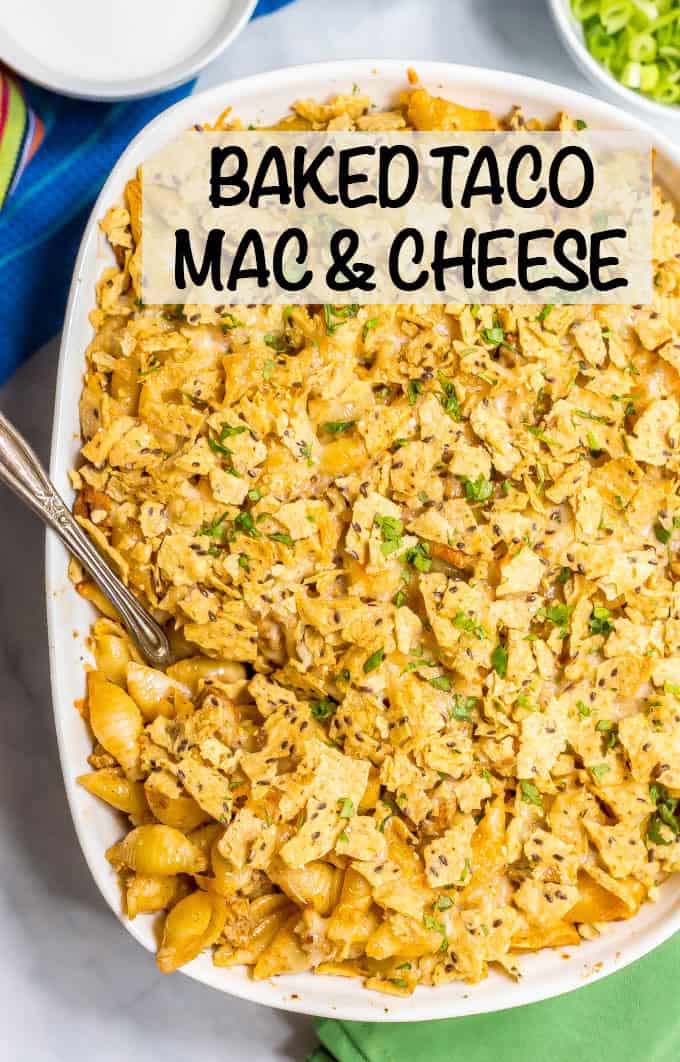 Baked taco mac and cheese casserole is an easy, family-friendly dinner with a creamy sauce and big taco flavor. Add your favorite toppings and dig in! #macandcheese #macaroni #pastadinner #tacos #tacodinner