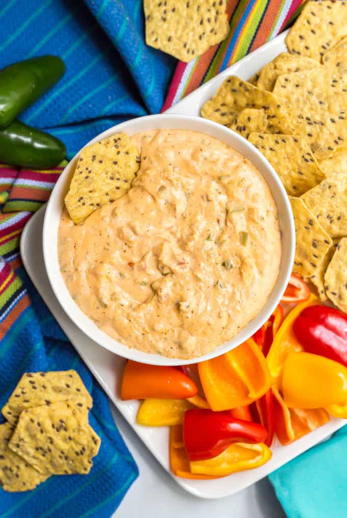 This quick and easy jalapeño cream cheese dip is perfect for parties, served warm with tortilla chips and veggies for dipping. Adjust the spiciness to your liking and get ready to dig in! #jalapenos #jalapenodip #creamcheesedip #appetizers