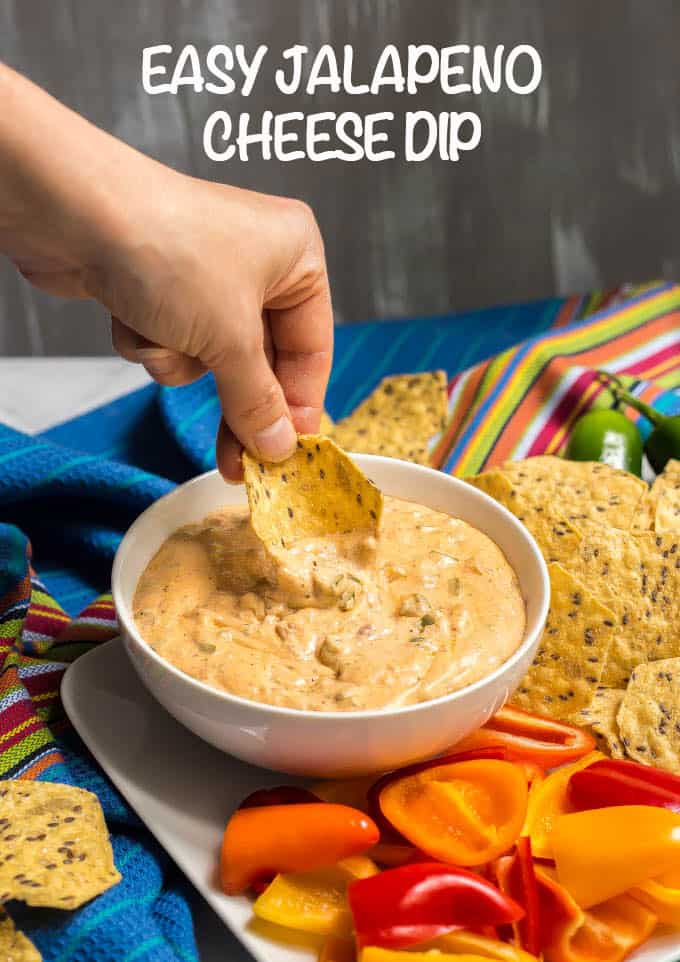 This 10-minute easy jalapeño cream cheese dip is perfect for parties, served warm with tortilla chips and veggies for dipping. Adjust the spiciness to your liking and get ready to dig in! #jalapenos #jalapenodip #creamcheesedip #appetizers