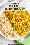 A coconut chicken curry mixture with peas and tomatoes served alongside steamed rice with cilantro on top.
