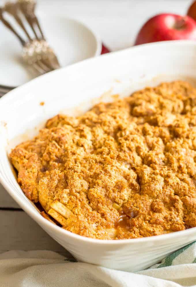 Baked healthy apple cobbler in a white casserole dish