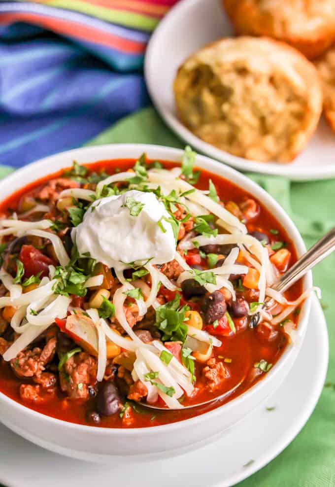 This 30-minute healthy southwest turkey chili with corn and black beans makes a great, easy dinner for a chilly night. Add your favorite toppings and get ready to dig in! #turkey #chili #healthy #dinner #glutenfree #lowcarb