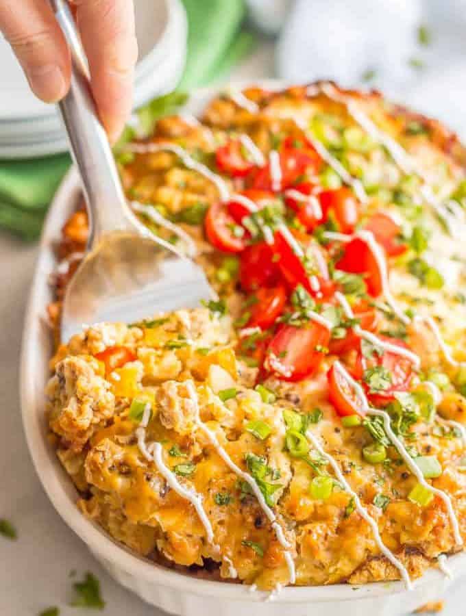 Overnight slow cooker breakfast casserole is perfect for a delicious, hearty and super satisfying make-ahead brunch dish that will have everyone going back for seconds! #slowcooker #crockpot #breakfast #casserole #holidays