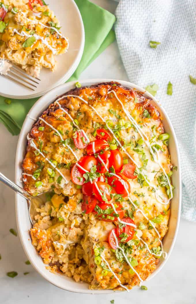 Overhead shot of overnight crock pot breakfast casserole with a scoop being taken out