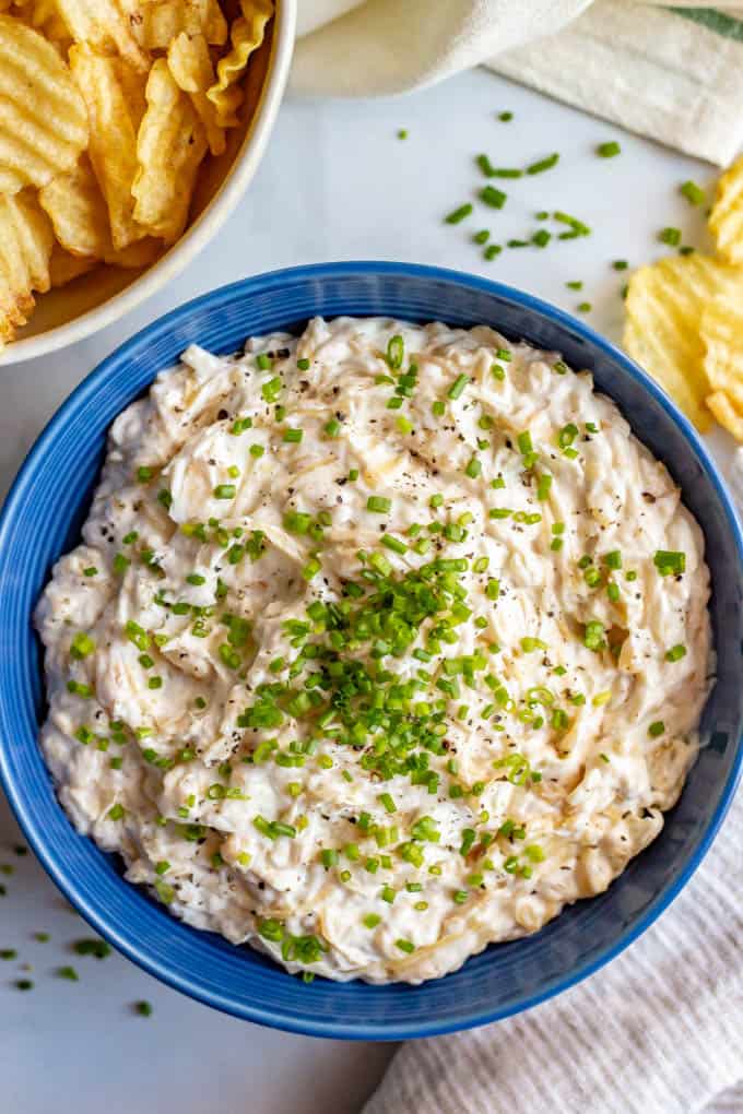 This healthier caramelized onion dip is lightened up but still super rich and creamy and perfect for dipping! Everyone goes crazy for this easy appetizer! #onions #easyappetizer #gamedayeats #snackattack