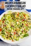 Mediterranean chopped salad is a crunchy, flavorful salad with chick peas, olives and feta cheese - perfect for a vegetarian and gluten-free lunch or light dinner! #choppedsalad #mediterraneansalad #vegetariansalad #saladlove #glutenfree