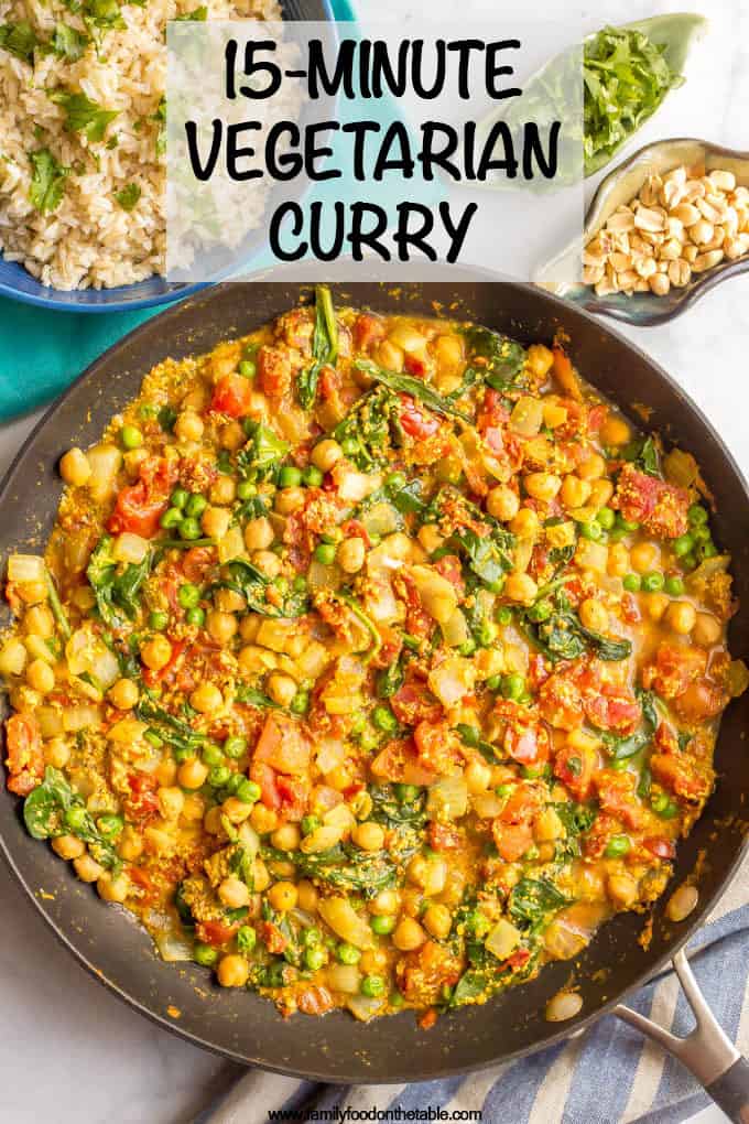 This quick and easy vegetarian curry is loaded with chickpeas, spinach, green peas and plenty of warm spices for a bright, beautiful and flavorful dinner! #curryrecipe #vegetariancurry #easyvegetarian #quickeasydinner