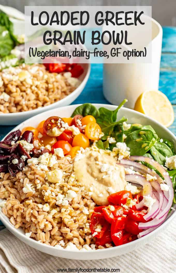 Vegetarian Greek grain bowls are loaded with wholesome grains and veggies and topped with an easy red wine vinaigrette for a beautiful and delicious lunch or light dinner! #grainbowl #mealprep #vegetarian #lunchideas #mediterraneanfood